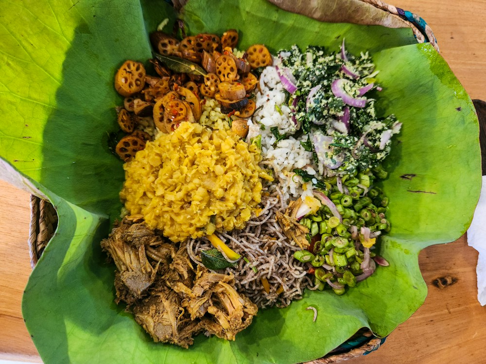 A Sri Lankan rice and curry meal served on a leaf
